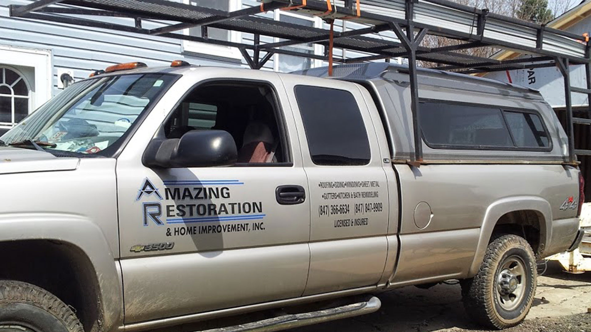 Carpentersville and surrounding areas Amazing Restoration & Home Improvement Inc Truck